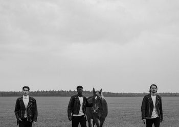 Diverse group of people walking together outdoors