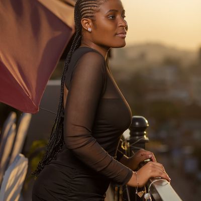 Portrait of a smiling woman trainer with warm lighting
